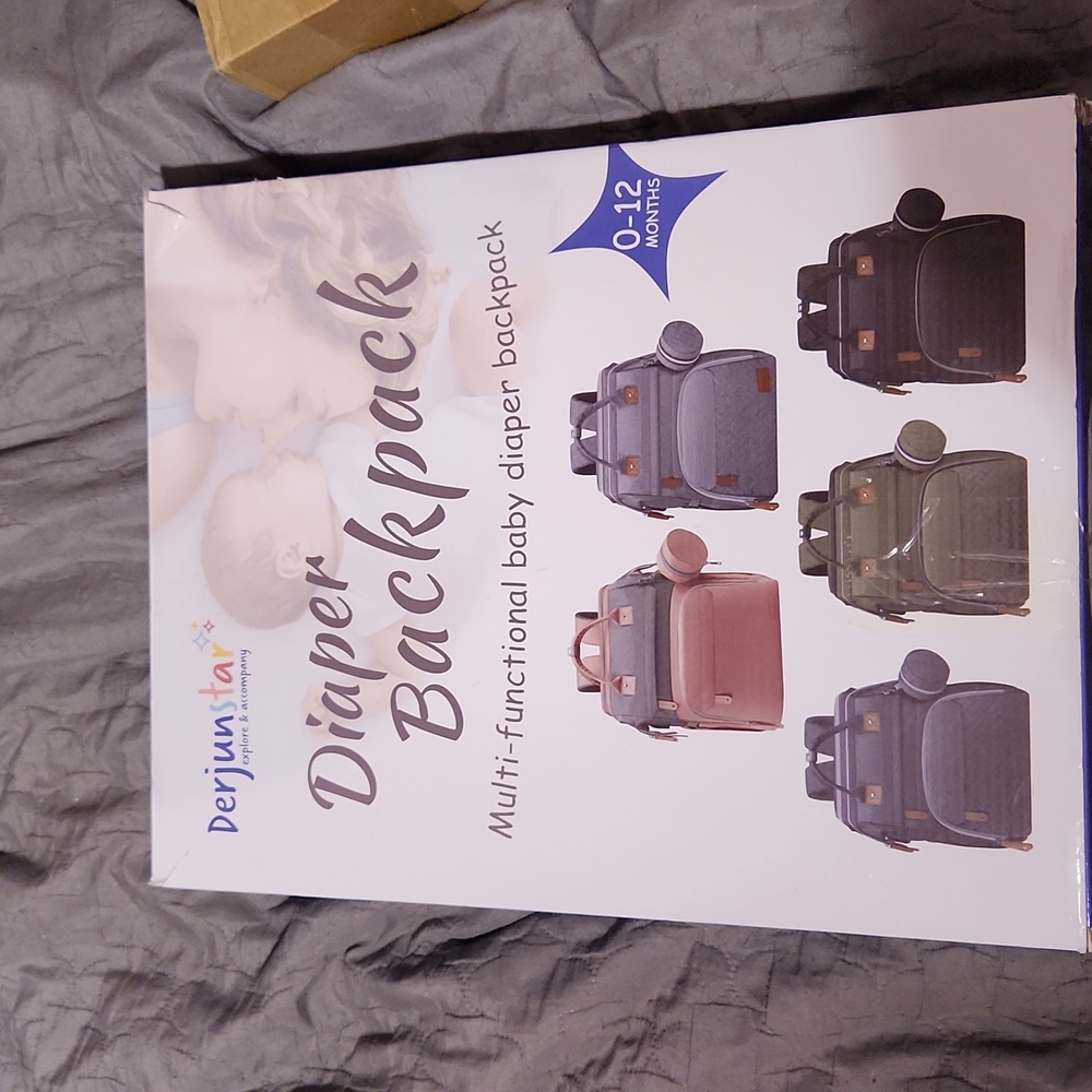 Brand New Derjunstar Diaper Backpack with changing station in pale pink